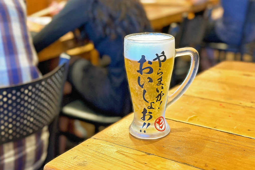 サッポロ生ビール（$6.00）